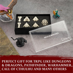 LYNX Skull & Bone dice close-up reveals balanced acrylic construction for fair rolls.