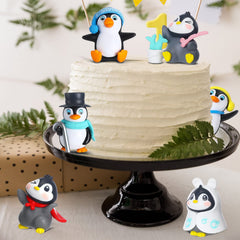 Macarrie penguin figurines in varied poses inspire playful learning and storytelling.