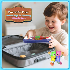 Magnetopia tiles in hand illustrate tactile engagement and motor skill development.