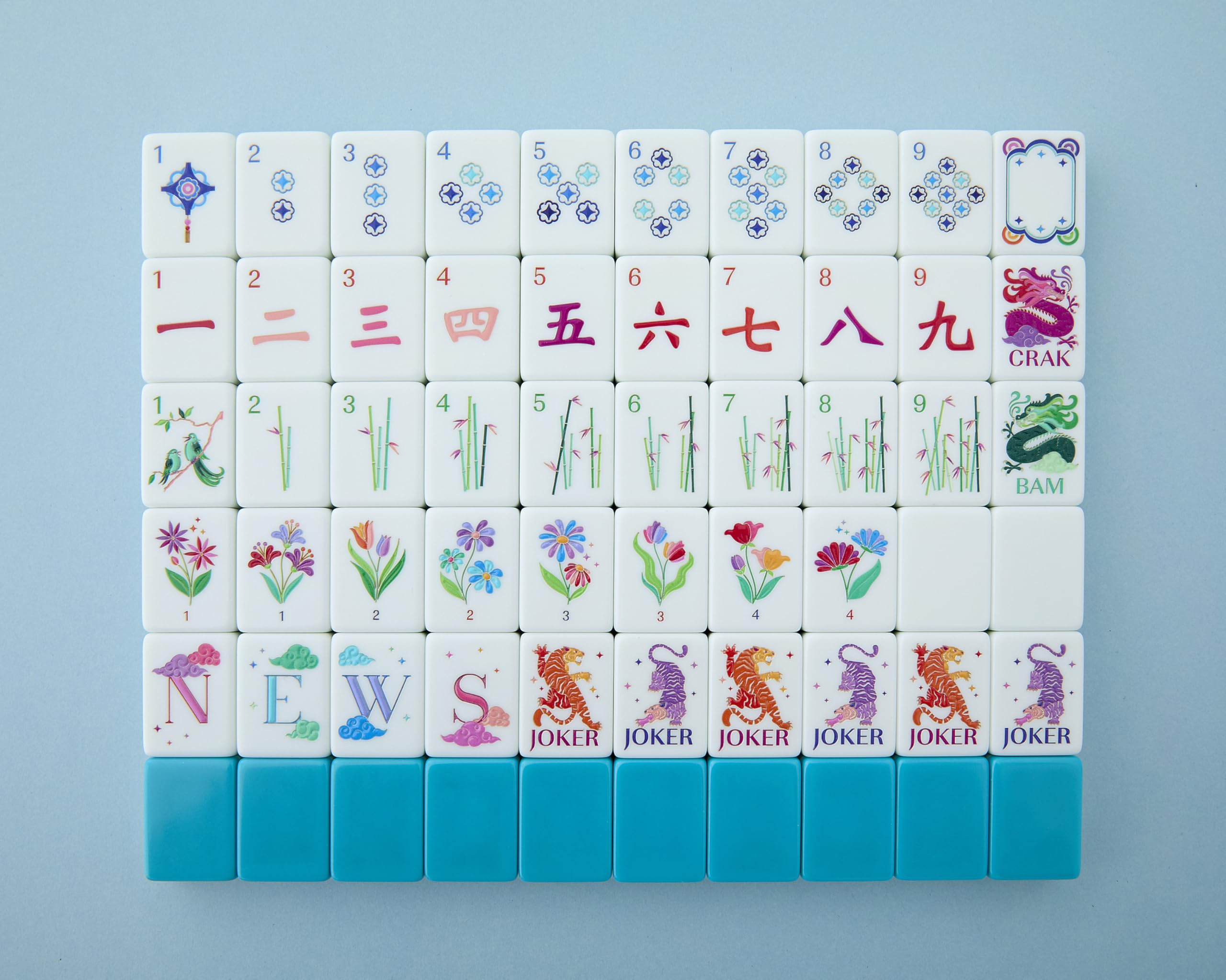 Mahjong Co Celestial teal-backed tiles for stylish, portable game nights.
