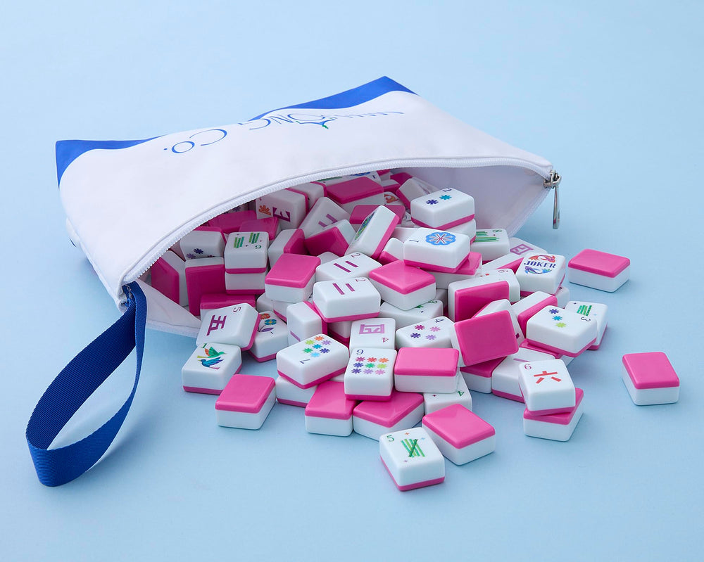 Contents include 160 acrylic tiles and a sleek bag