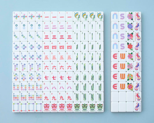 Paradise tiles stacked on the side highlight lightweight, travel-friendly design.