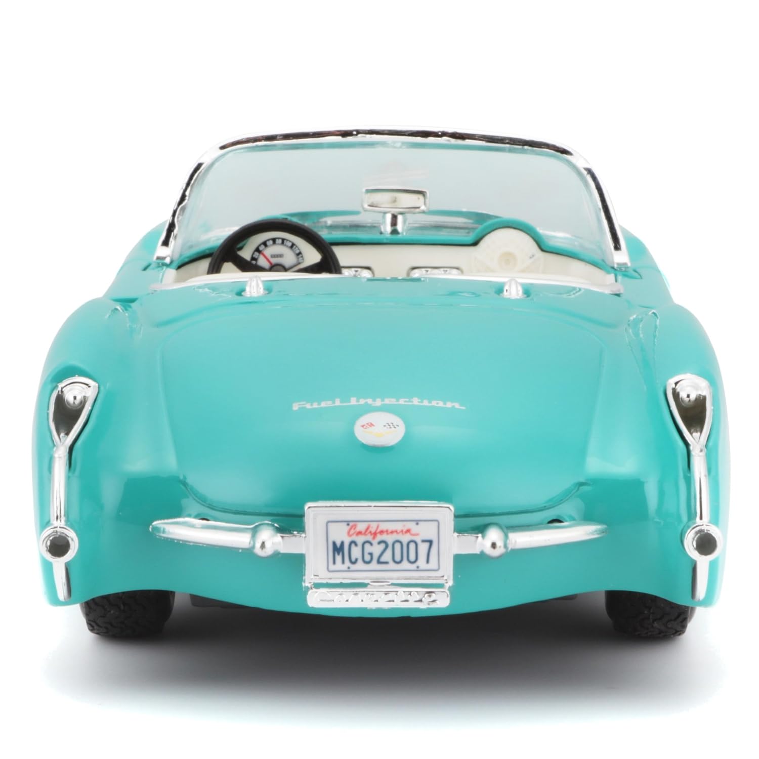 Maisto 1:24 Corvette turquoise engine compartment showcases accurate detailing.