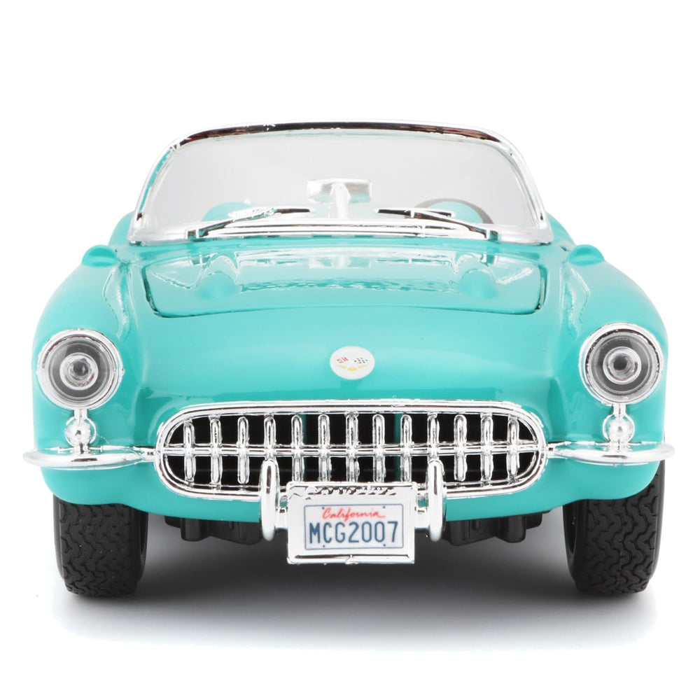 Maisto 1:24 Corvette turquoise open doors reveal interior realism.
