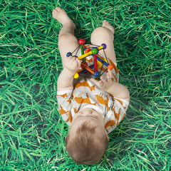 Manhattan Toy Skwish Classic 6 inch colorful beads on dowels provide tactile stimulation and cause-and-effect play.