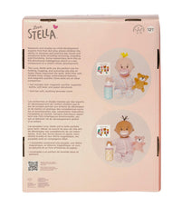 Storybook and soft bear accompany Wee Baby Stella for cozy storytelling moments.