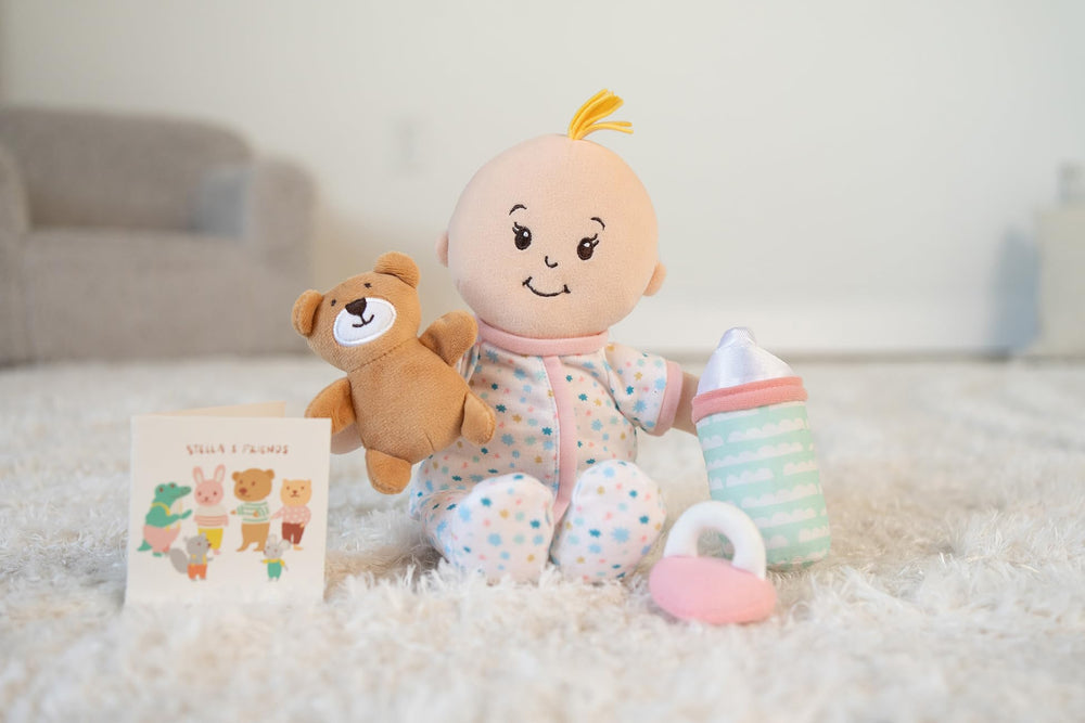 Manhattan Toy Wee Baby Stella storybook enhances imaginative storytelling.