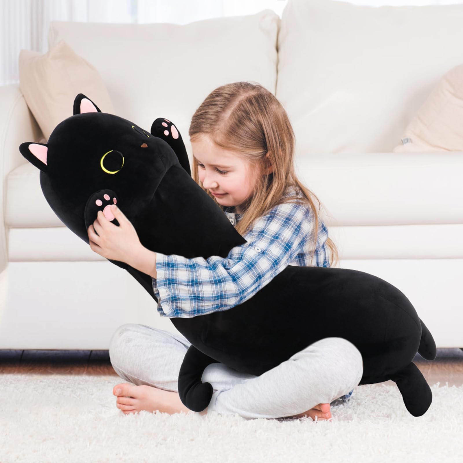 MaoGoLan cat plush hugging on sofa as a cozy decor companion.