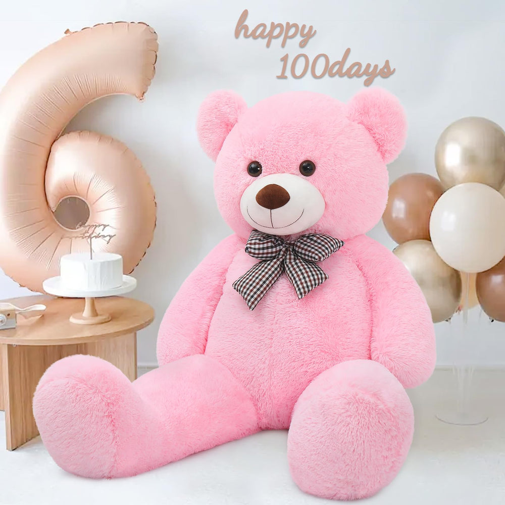 MaoGoLan pink teddy bear in room, a charming decor and comforting companion