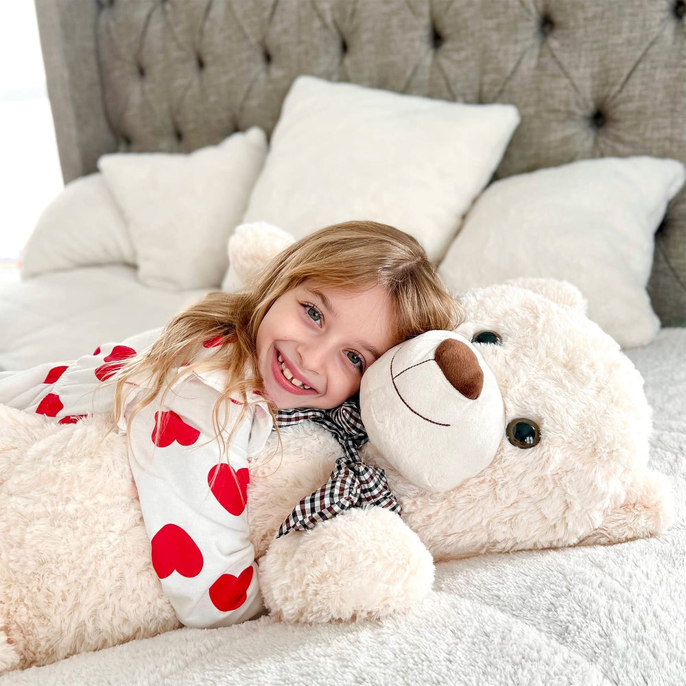 Bedroom decor accent with MaoGoLan giant teddy bear for cozy vibes.