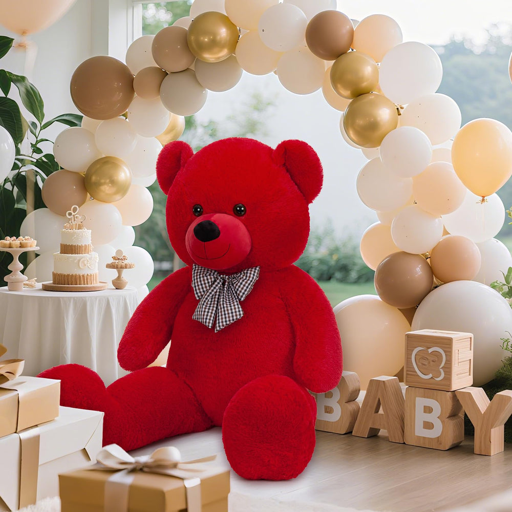 Maogolan Giant Teddy Bear seated beside furniture creates warm, welcoming vibe.