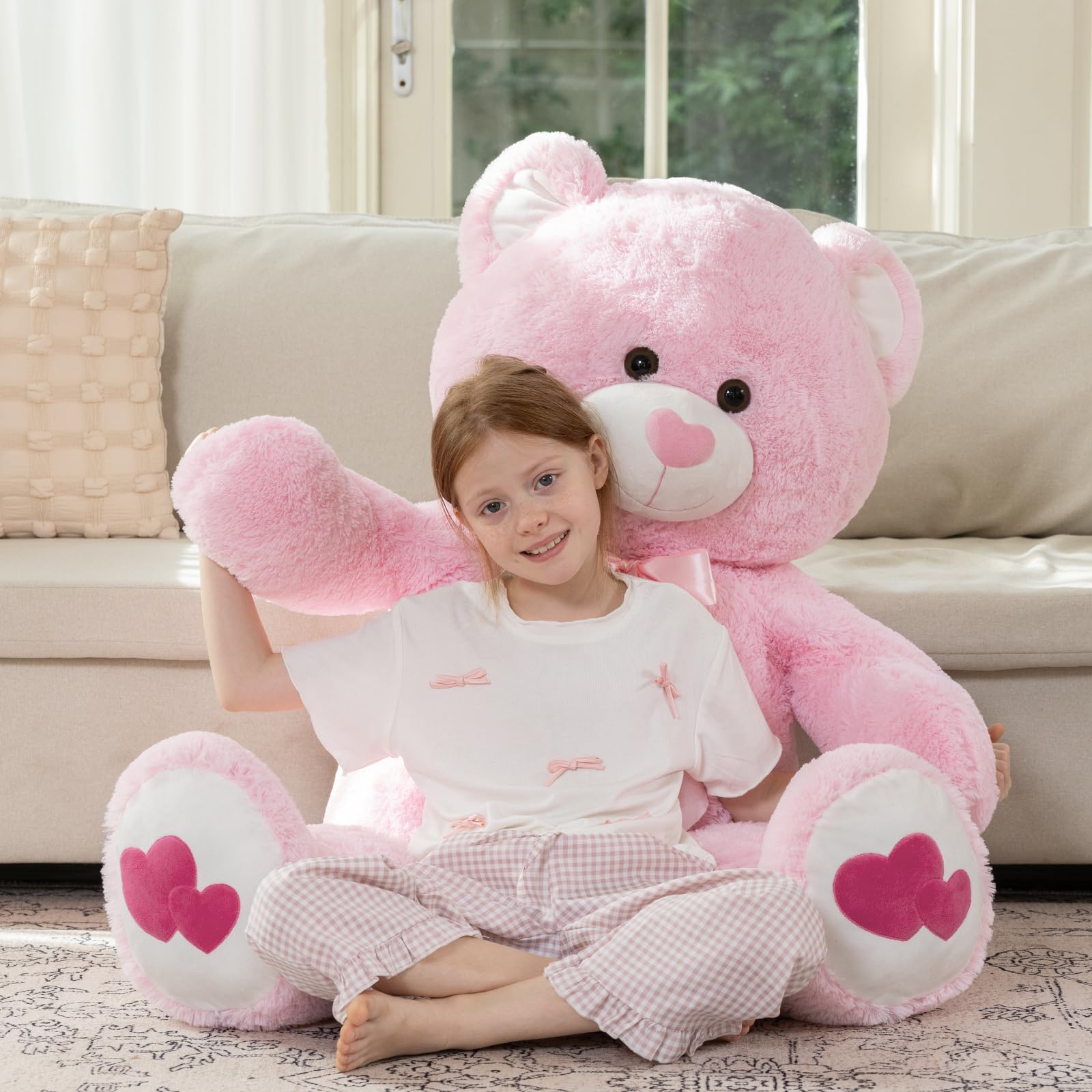 MaoGoLan teddy bear with heart footprints detail, a charming keepsake symbolizing care.