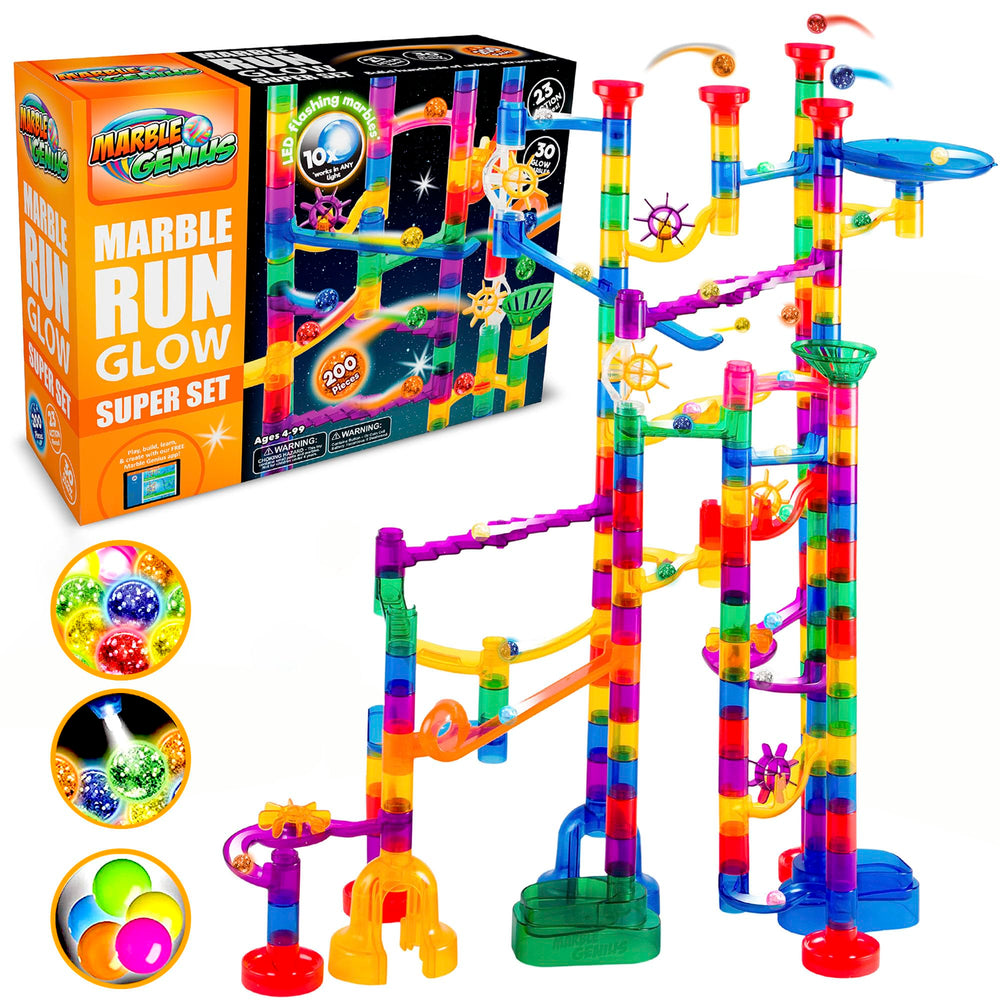Marble Genius marble run track with space theme and glow-in-the-dark pieces for night play.