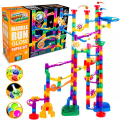 Marble Genius marble run track with space theme and glow-in-the-dark pieces for night play.