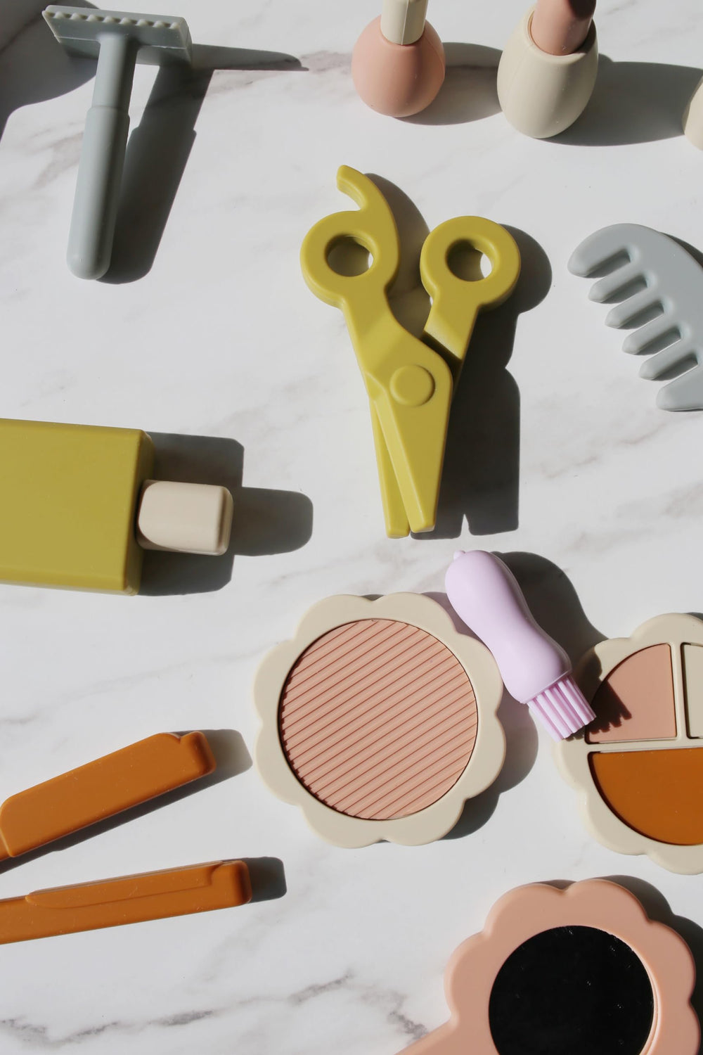 Marlowe & Co toddler-friendly beauty tools for fine motor practice.