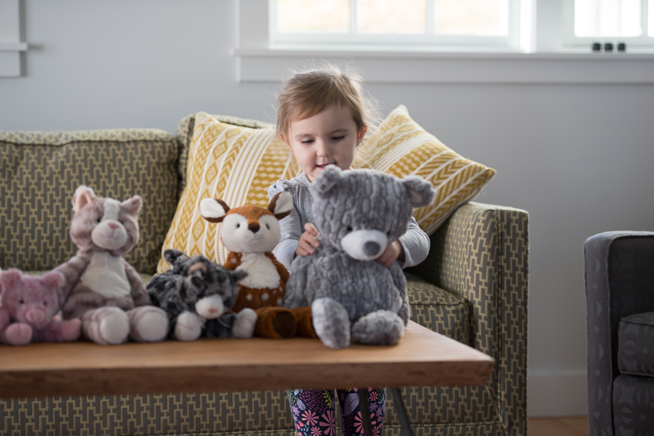 Mary Meyer Marshmallow Zoo Fawn with spotted coat for cozy snuggling and imaginative play.