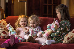Mary Meyer Fro-Yo Unicorn footpads with gold accents for stylish snuggles.