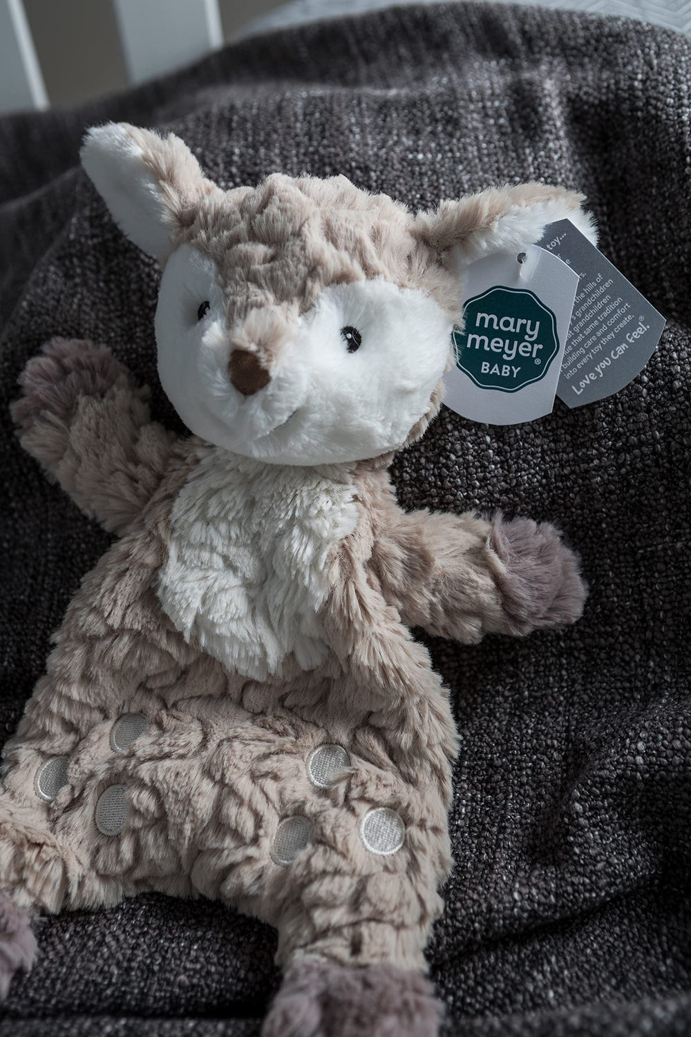 Weighted bum and floppy body encourage easy grip and cuddles.