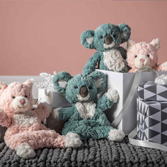Mary Meyer Putty Kitty Lovey with embroidered eyes for gentle, soothing interaction.
