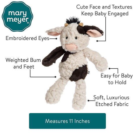 Mary Meyer Putty Nursery Cow textured fabric invites tactile exploration for babies.