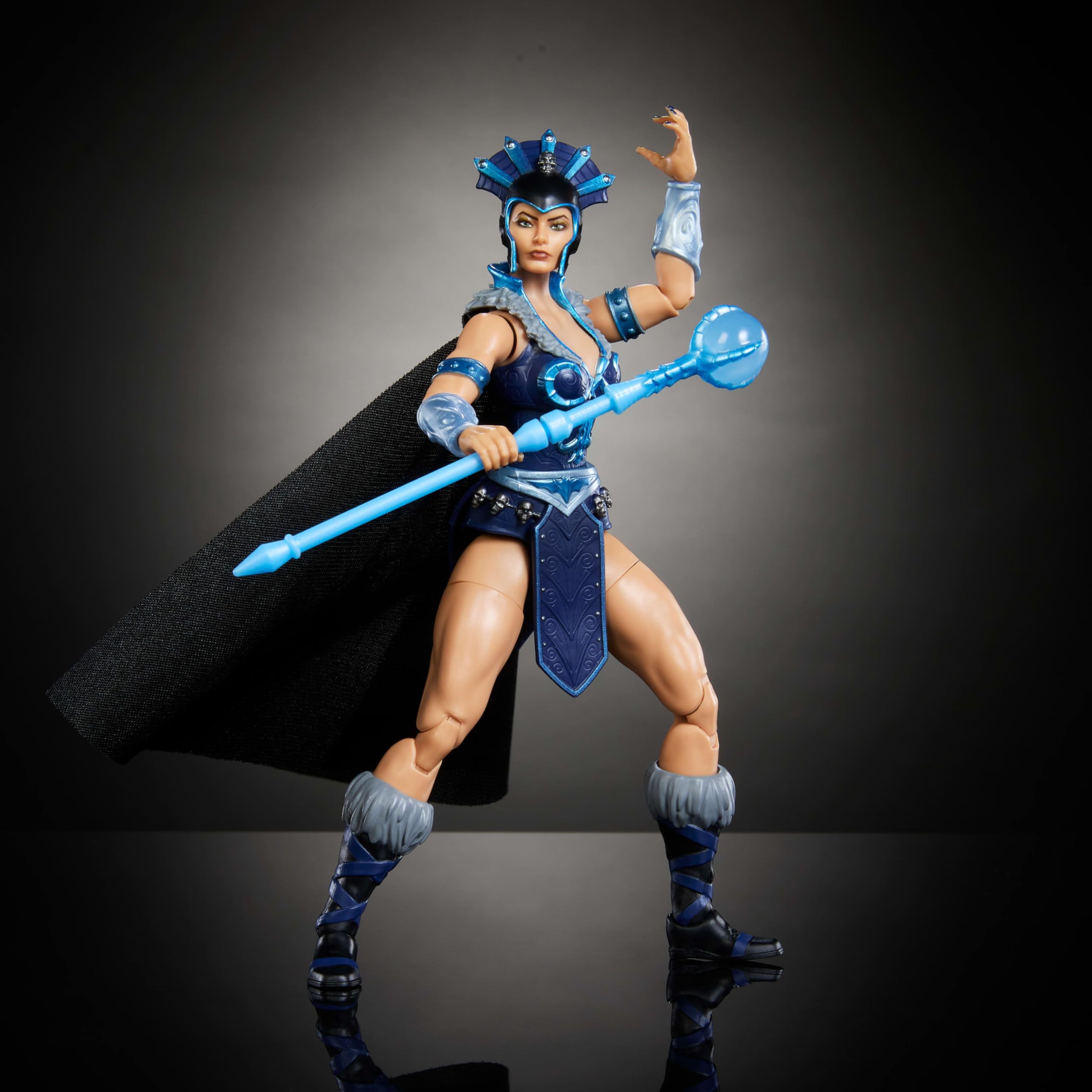 Removable soft cape on Evil-Lyn for versatile presentation.