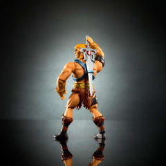 Masters of the Universe Origins He-Man wielding Power Sword and fanged shield for heroic play