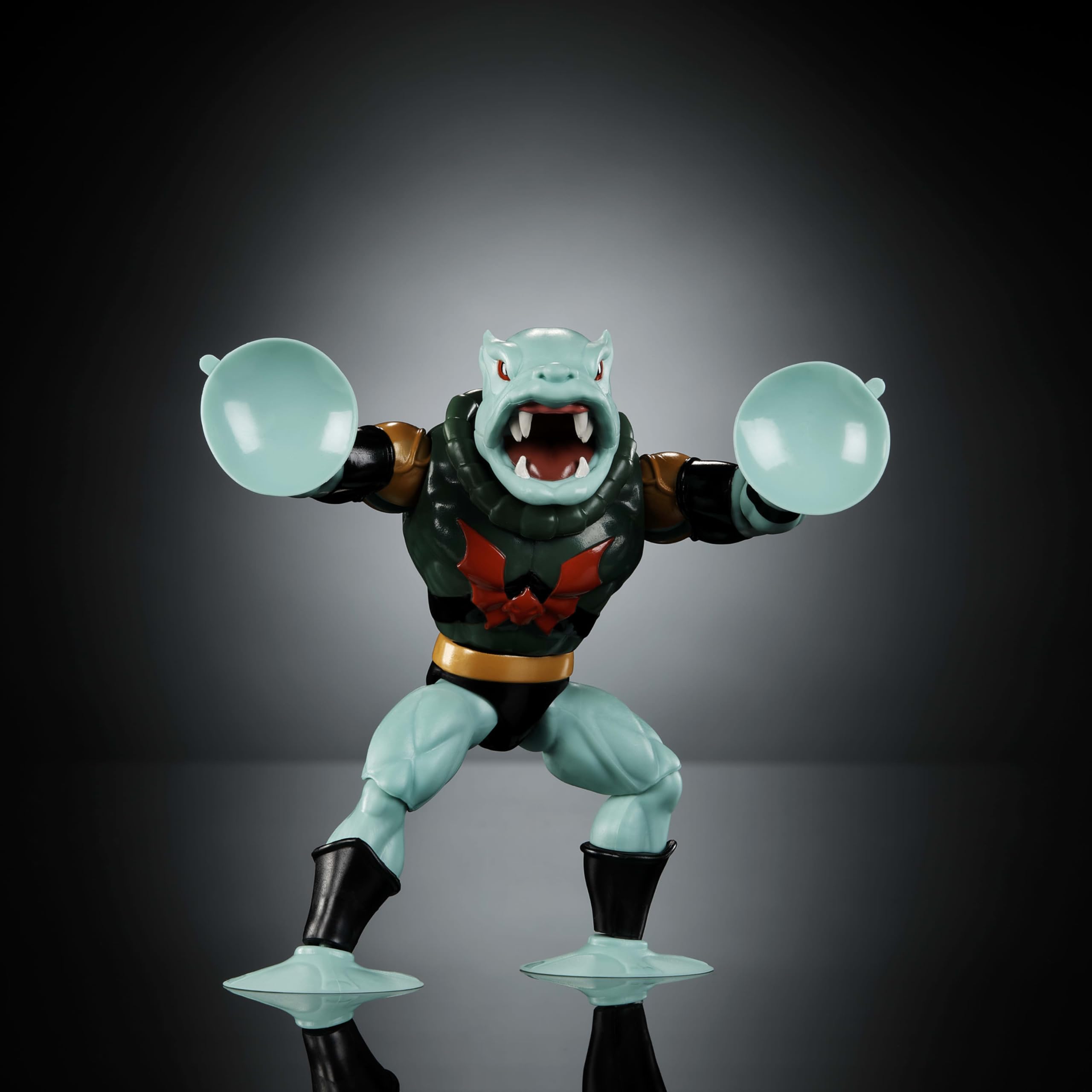 Masters of the Universe Origins Leech blaster accessory included for action poses.