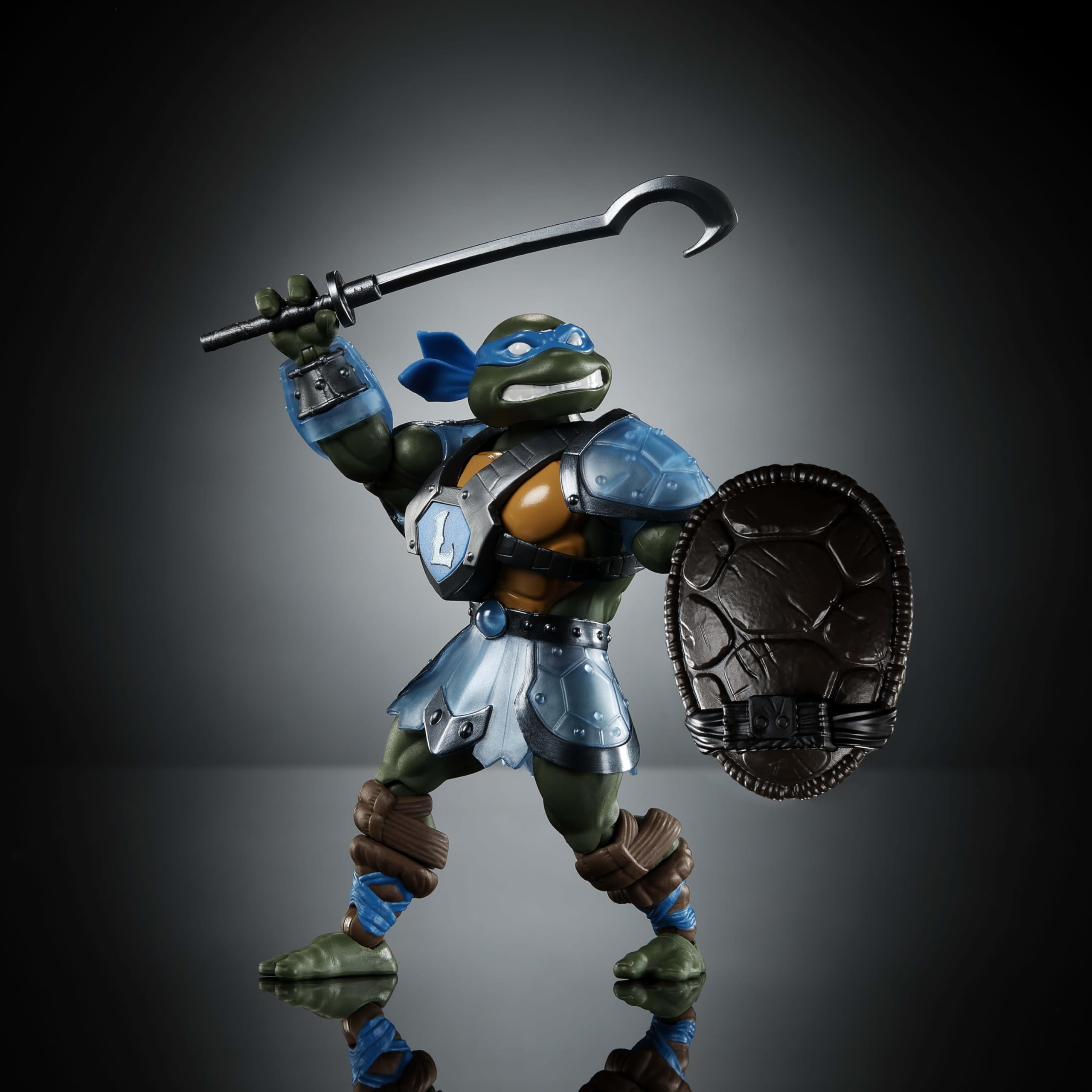 Masters of the Universe Origins Leonardo dual swords with capture hook for Reptile Wars battles.