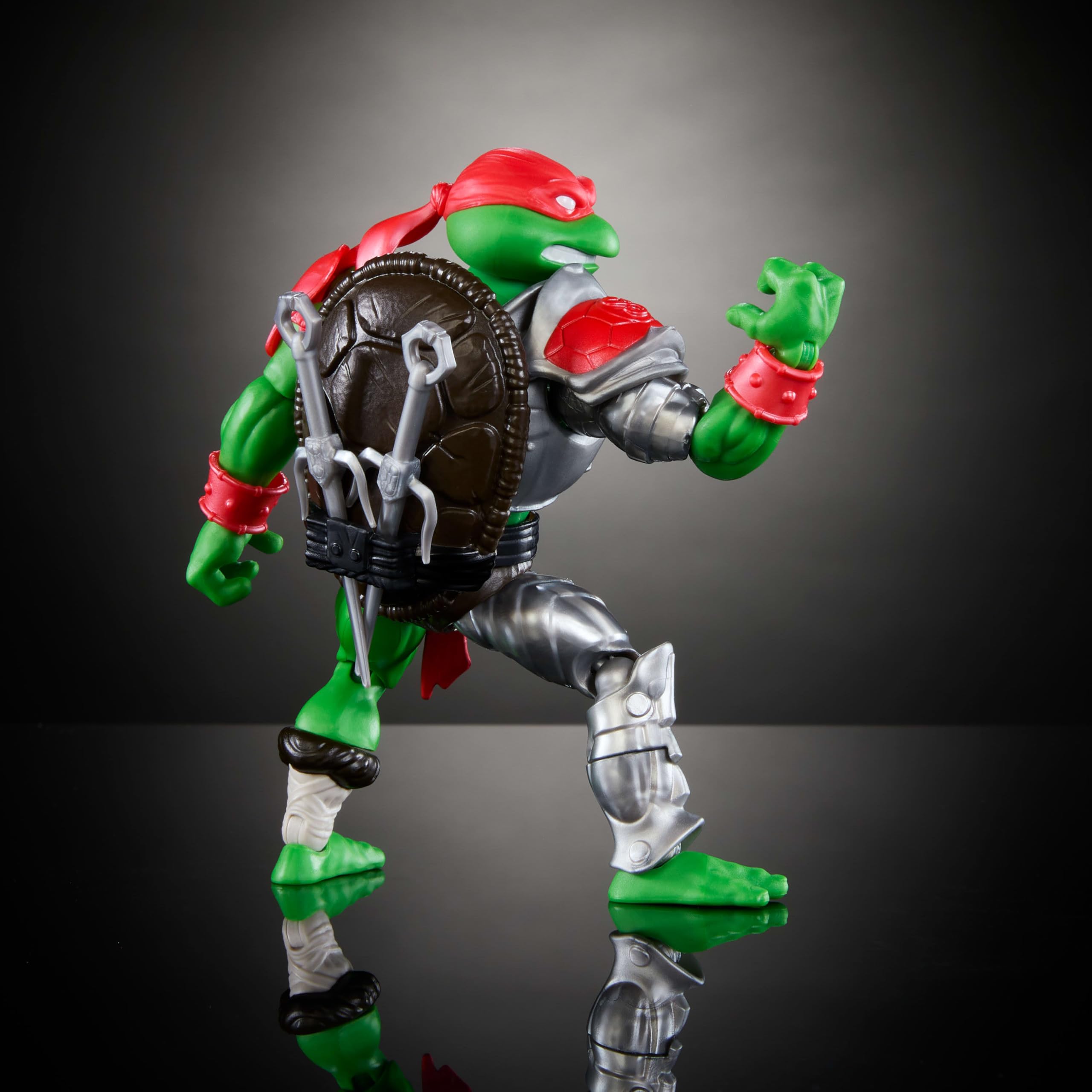 Raphael action figure with 16 joints enables dynamic stances.