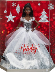 Barbie 2021 Holiday doll earrings and makeup brighten iconic holiday look on display.