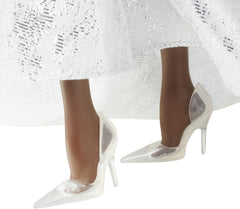 Barbie Signature 2021 Holiday doll tulle peplum adds voluminous sparkle for imagination.