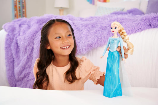 Mattel Elsa in blue dress with side braid for movie-inspired role play