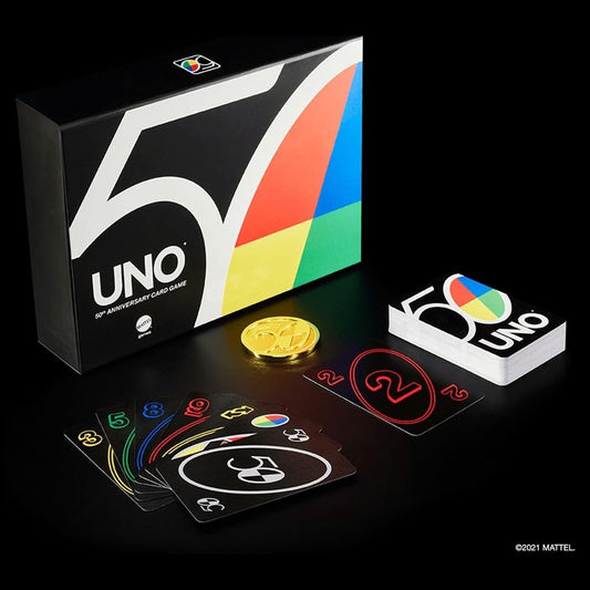 Mattel Games UNO Premium 50th Edition commemorative gold coin adds collectible value to play.