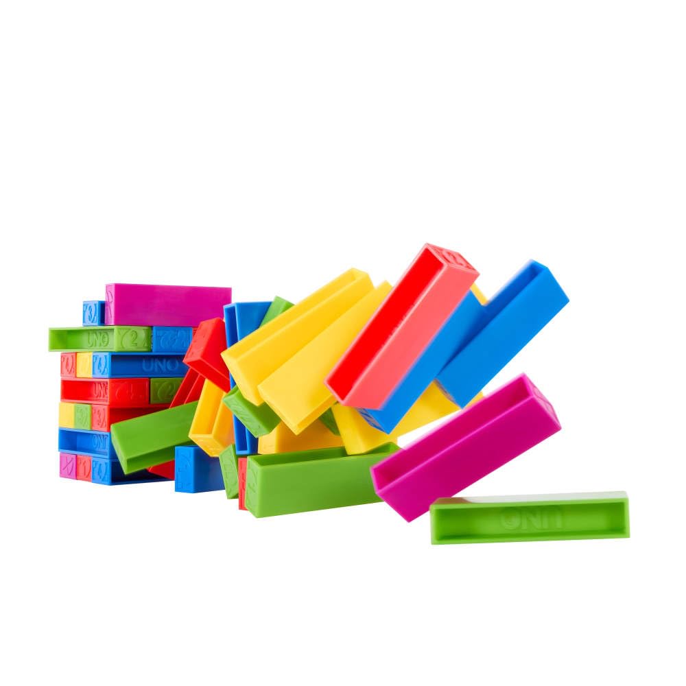 UNO Stacko action blocks show symbols like Reverse and Draw 2