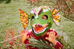 Mattel Dilophosaurus mask roars when the jaw opens for immersive dinosaur role play.
