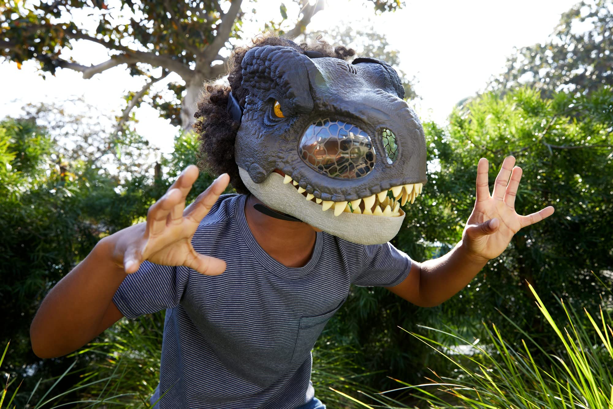 Mattel Jurassic World Chomp N Roar mask demonstrates jaw motion for dramatic chomps.