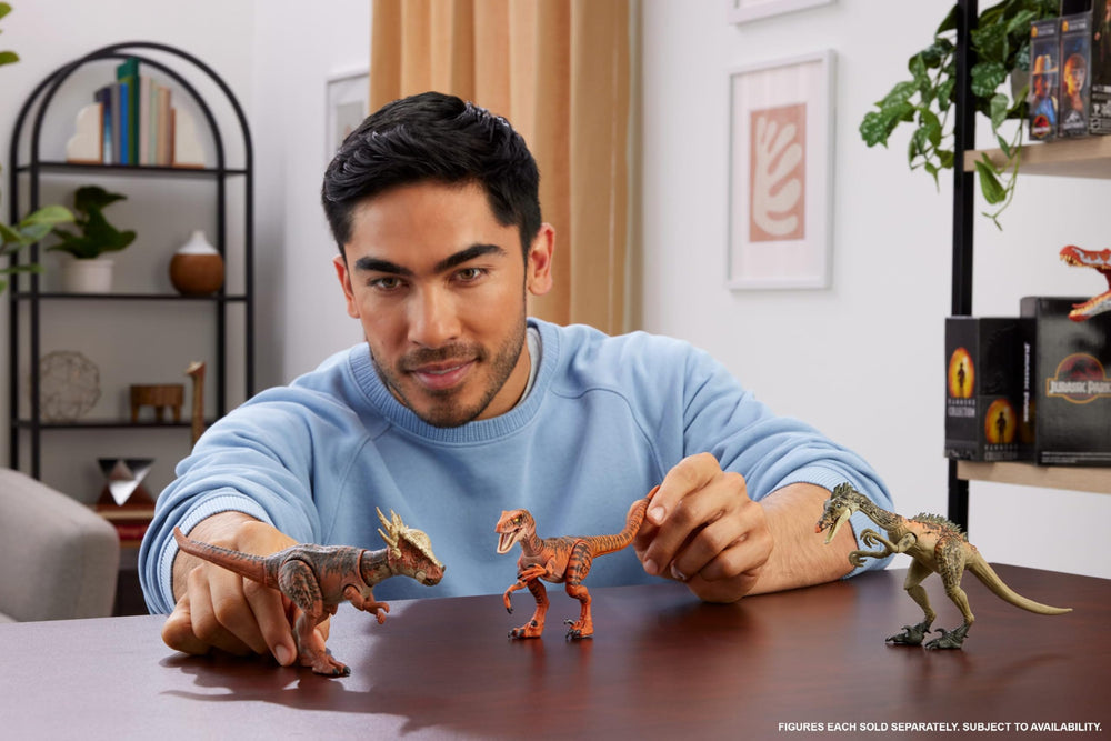 Mattel Jurassic World Hammond Atrociraptor Tiger in dynamic pose showing articulation.