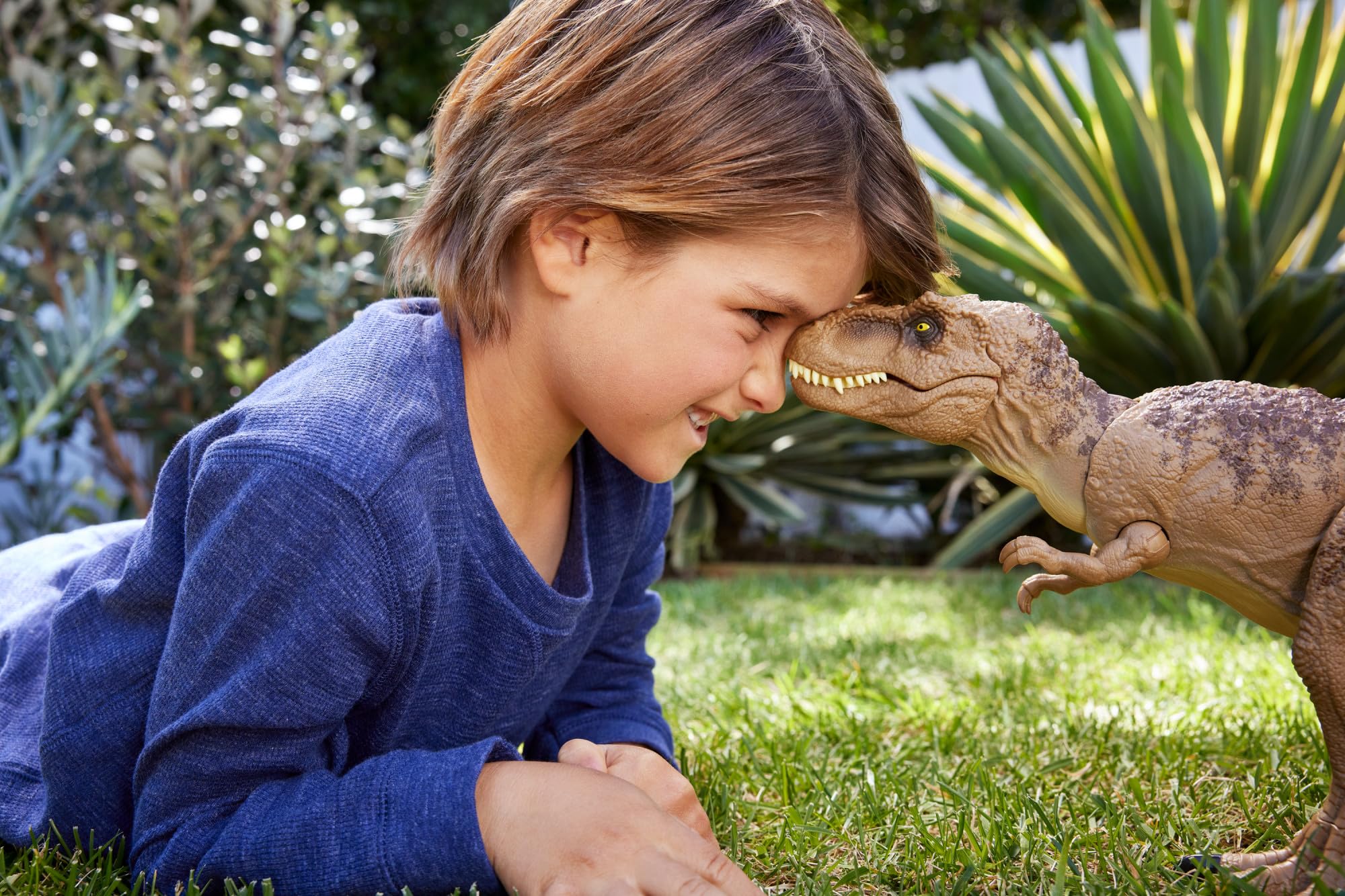 Mattel Jurassic World T. rex neck-thrash detail for dramatic play.