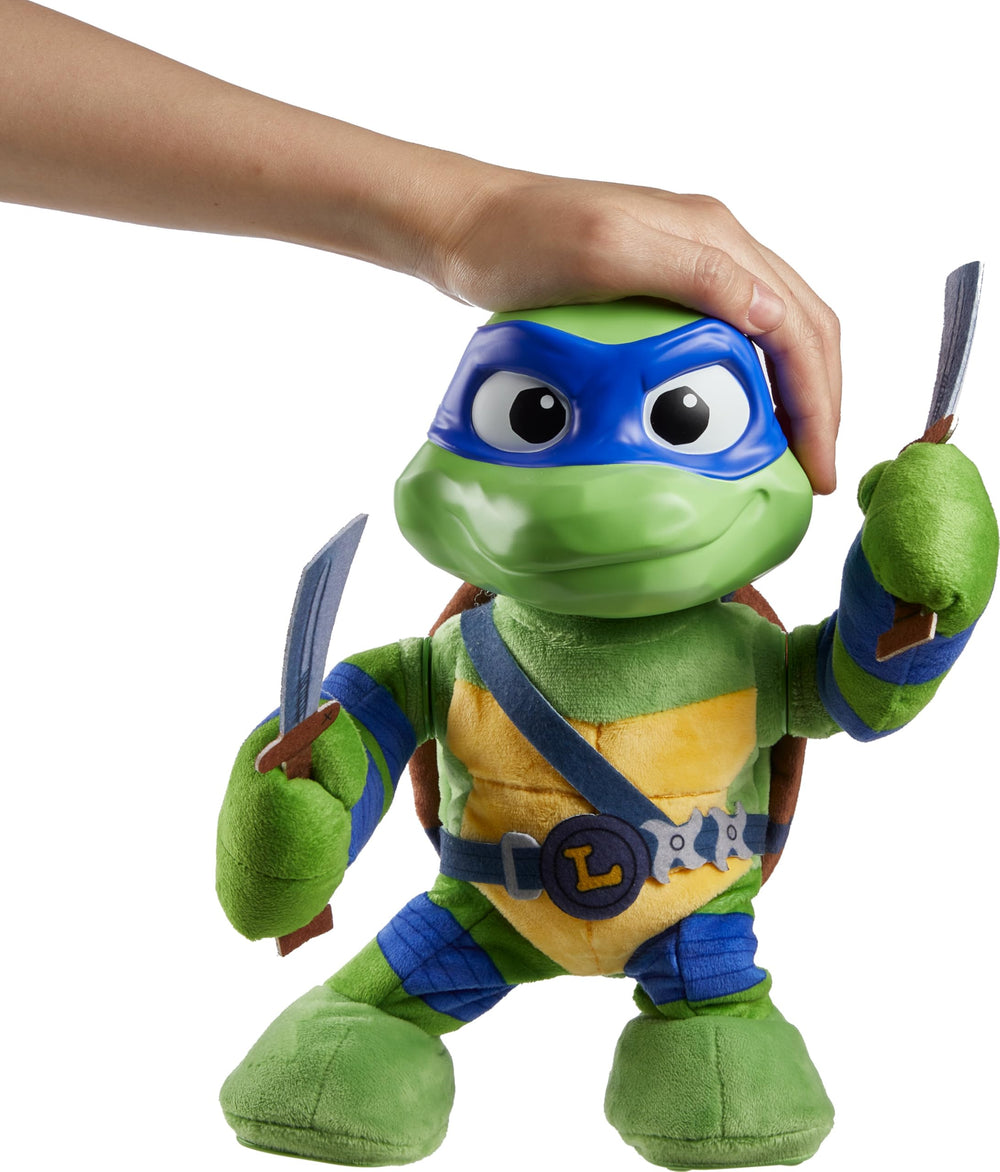 Mattel Leonardo TMNT plush sword-action demonstrates swinging play.