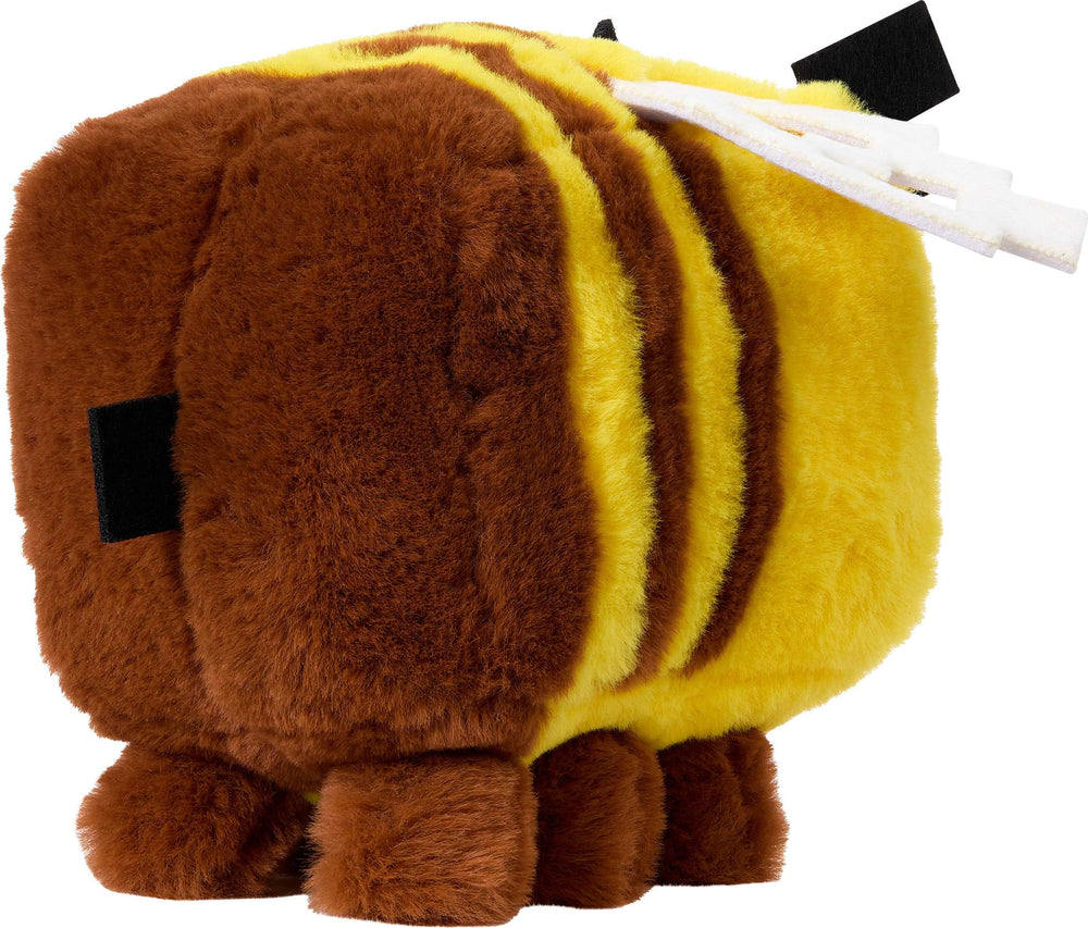Mattel Minecraft Bee plush toy held in hand for on the go play