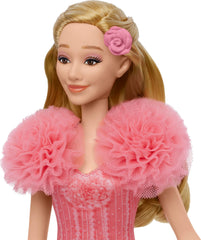 Mattel Glinda doll with matching shoes enhances outfits.
