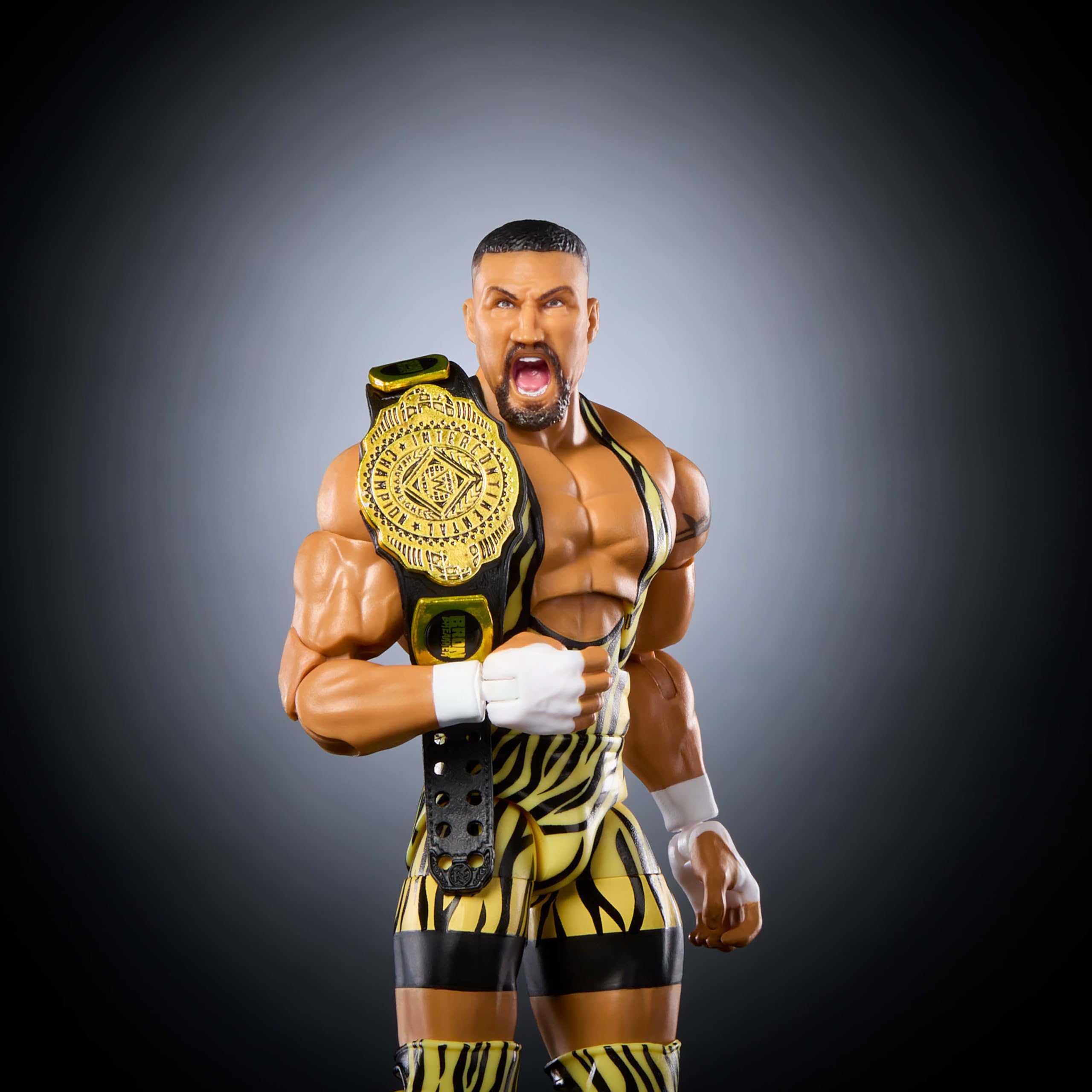 Mattel WWE Elite Bron Breaker accessories image pack for display options.