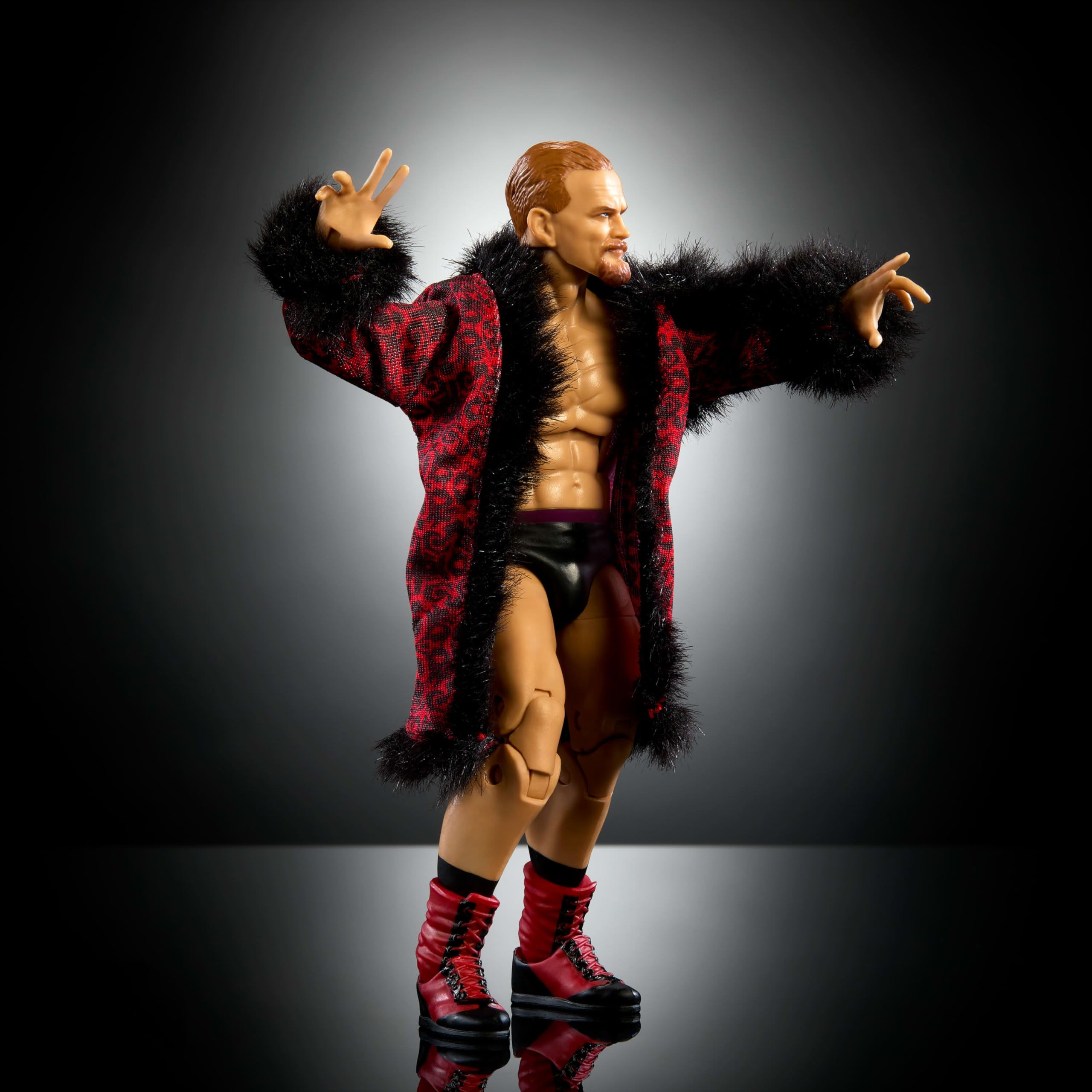 Includes iconic accessories for authentic ring-ready display and play with Ilja Dragunov