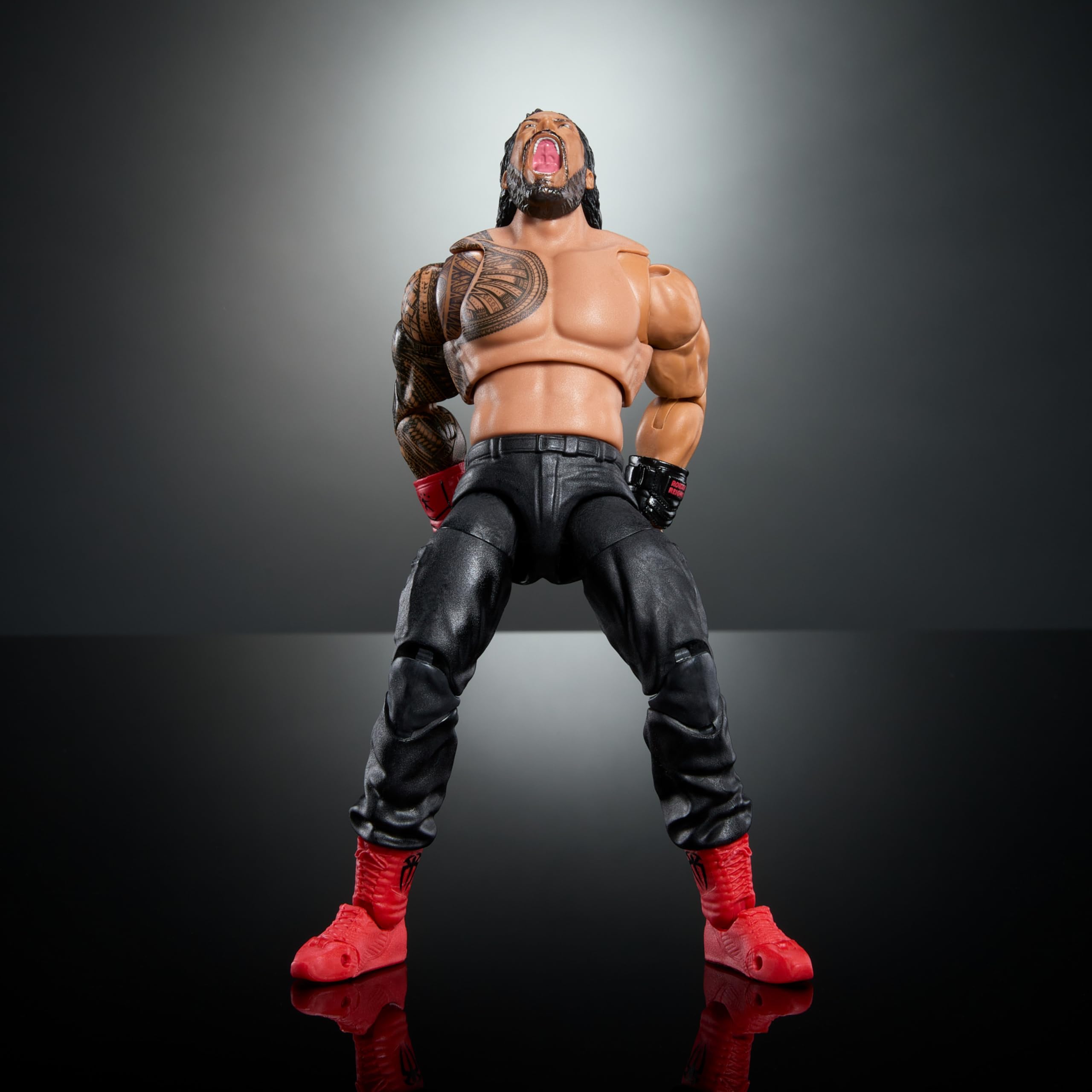 Mattel Roman Reigns swappable heads and hands for expression changes