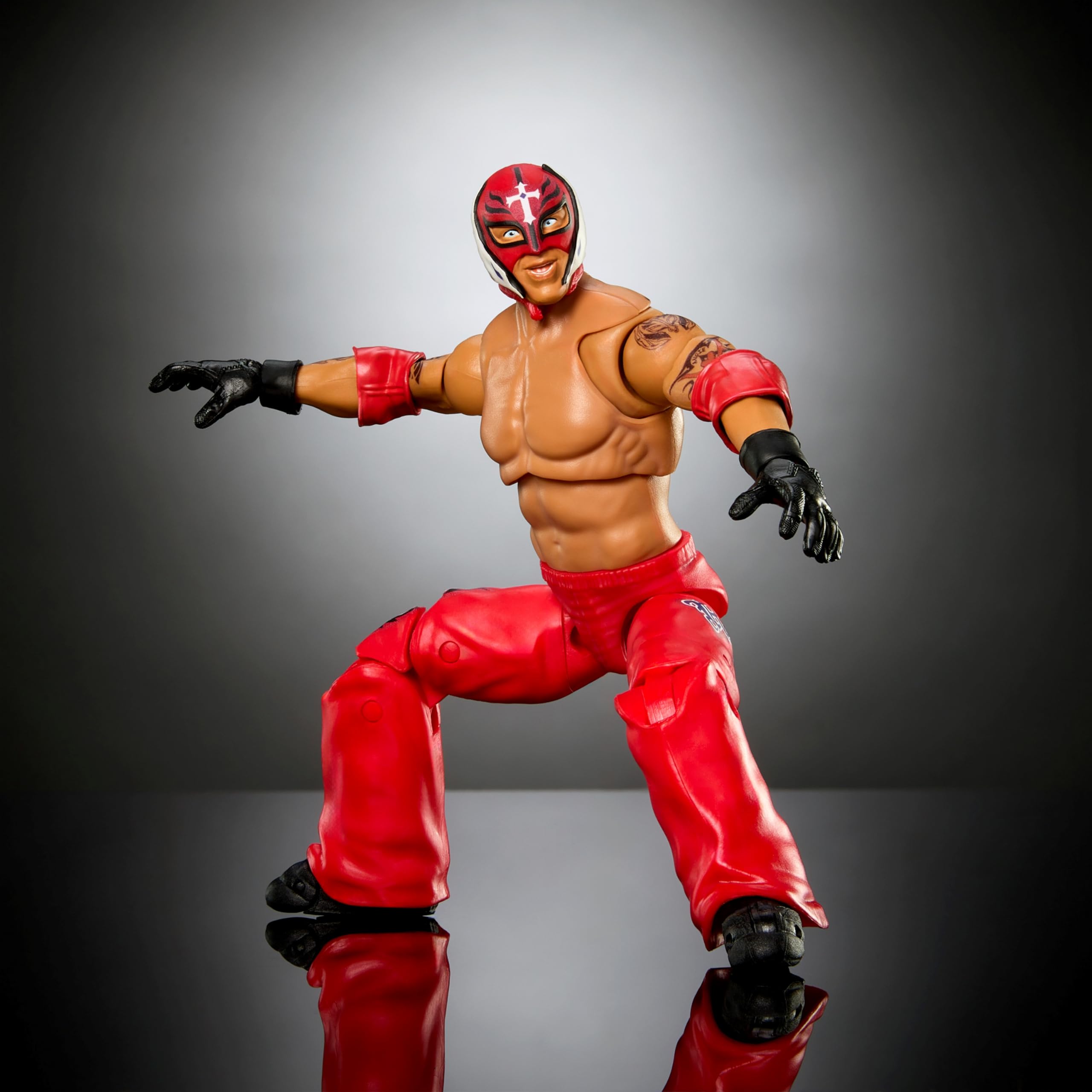 Mattel WWE Ultimate Edition Rey Mysterio authentic attire captures signature look.
