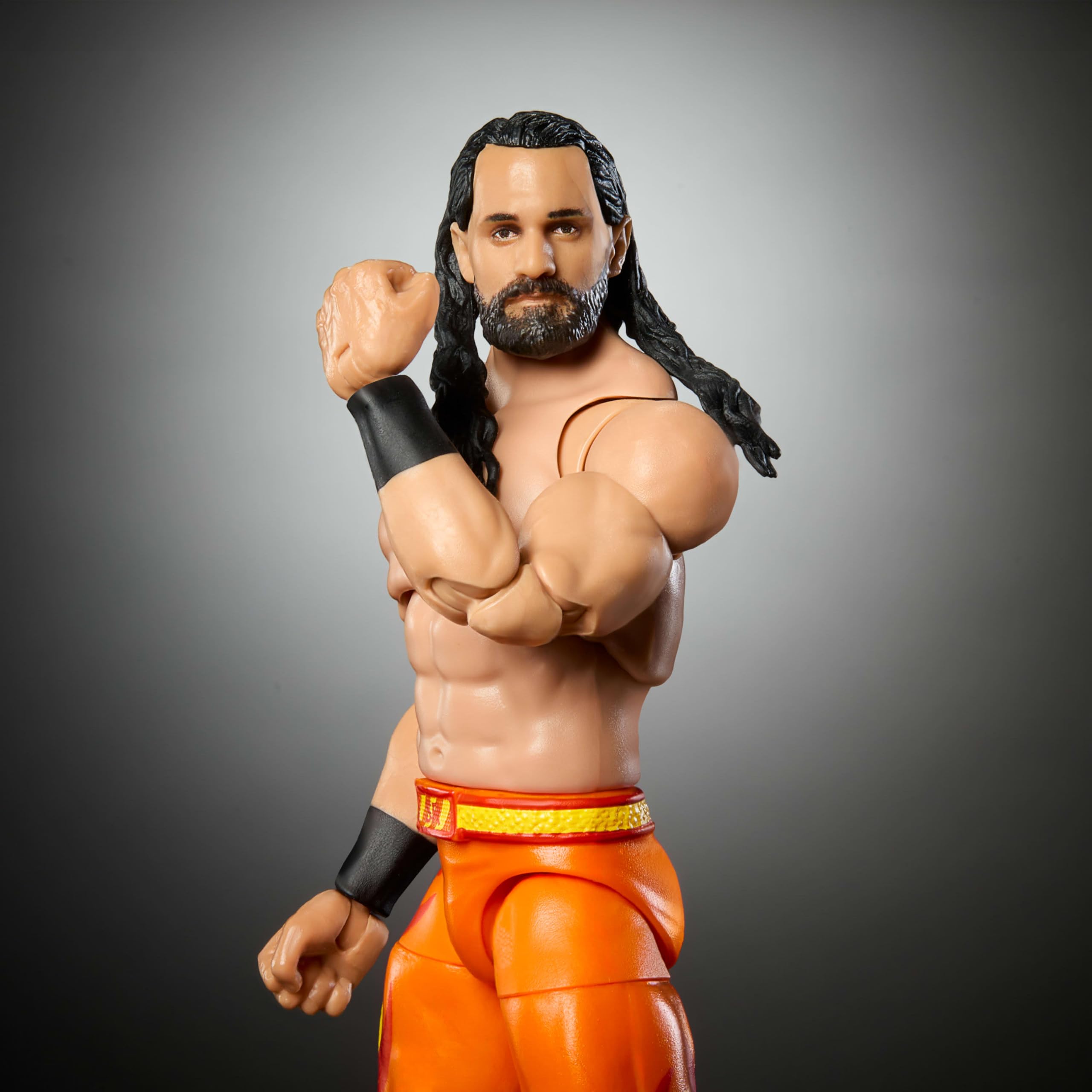 Mattel WWE Seth Rollins figure with interchangeable heads and hands for versatility.