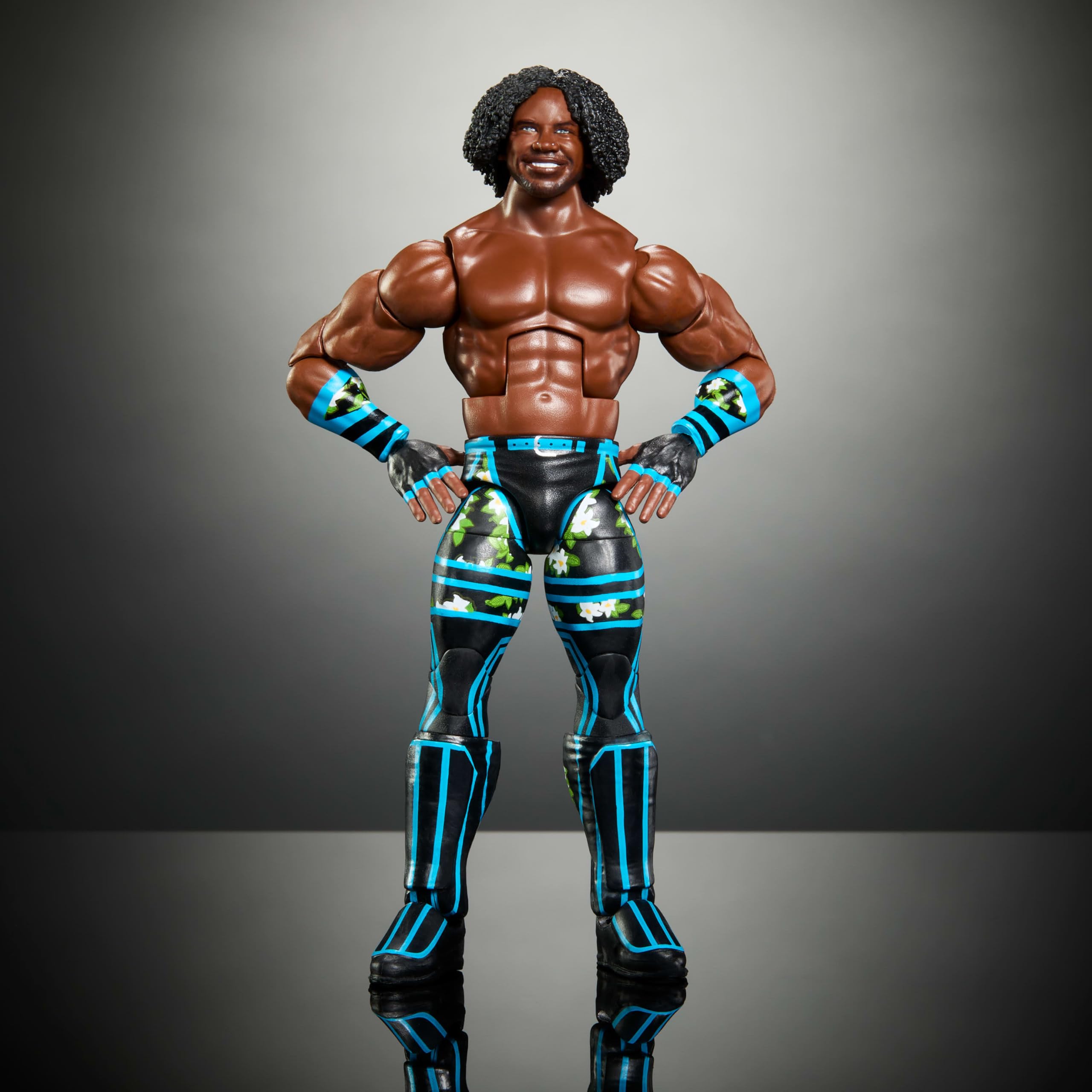 Xavier Woods figure includes iconic accessories for signature moves.