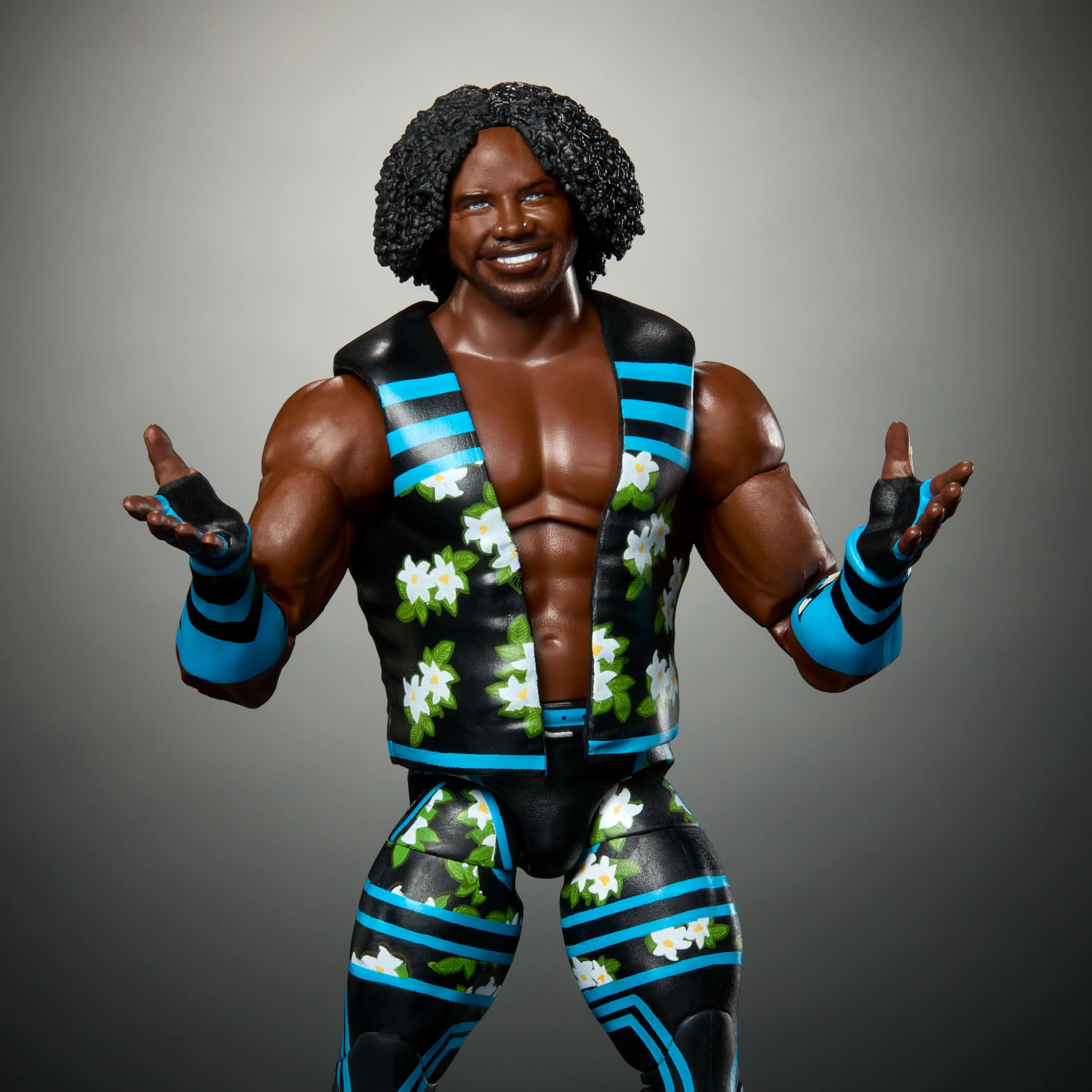 Xavier Woods figure showing interchangeable hands and accessories.