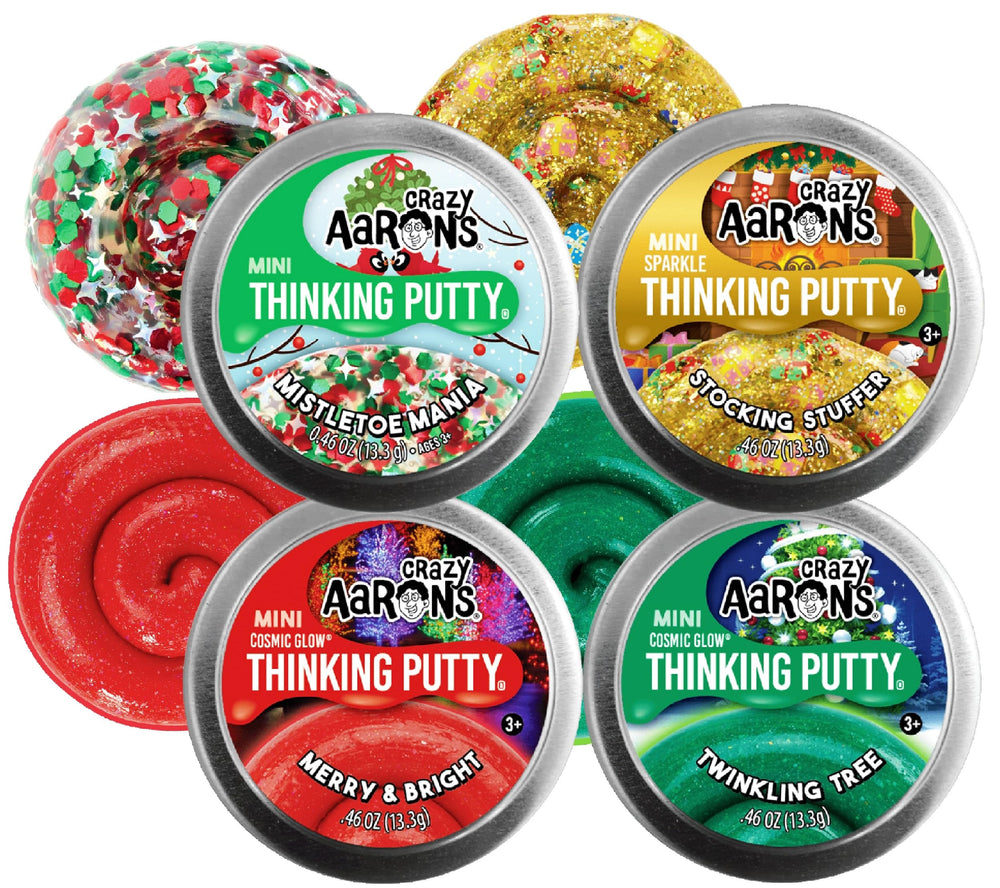 Matty's Toy Stop Crazy Aaron's Merry Bright Cosmic Glow putty in a mini tin with glow-in-the-dark fun.