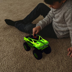 Maxx Action monster truck motorized drive in action across multiple surfaces.